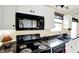 Updated kitchen features stainless steel appliances and plenty of counter space at 1234 Breaside Cir, Greenwood, IN 46143
