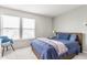 Comfortable bedroom offers plenty of natural light, and features a cozy, inviting aesthetic at 12444 Bearsdale Dr, Indianapolis, IN 46235