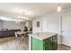 Open-concept dining area adjacent to kitchen island provides ample space for entertaining at 12444 Bearsdale Dr, Indianapolis, IN 46235