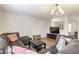 Inviting living room featuring a large sectional sofa and modern decor, perfect for relaxation at 12444 Bearsdale Dr, Indianapolis, IN 46235
