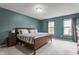 Spacious main bedroom with large windows and neutral carpet offers a relaxing retreat at 12444 Bearsdale Dr, Indianapolis, IN 46235