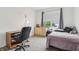 This bedroom features a large window with natural light, a neutral color scheme, and a comfortable layout at 12496 Wolf Run Rd, Noblesville, IN 46060