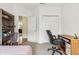 Bedroom features a single bed, neutral carpet, a closet, and a side table at 12496 Wolf Run Rd, Noblesville, IN 46060