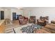 Inviting living room with wood-look flooring, offering a cozy atmosphere for relaxation and entertainment at 12496 Wolf Run Rd, Noblesville, IN 46060