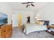 Inviting bedroom with natural light, including a walk-in closet and en-suite bathroom at 12496 Wolf Run Rd, Noblesville, IN 46060