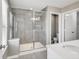 Modern bathroom featuring a glass shower and large vanity with ample counter space at 13050 Grand Vue Dr, Carmel, IN 46032