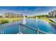 Community pond featuring relaxing fountain views from a steel railing at 13050 Grand Vue Dr, Carmel, IN 46032