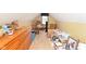 Attic area with wooden dressers and rocking chairs at 1352 Clinton St, Noblesville, IN 46060