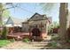 A backyard with an inviting deck, featuring outdoor seating and an outdoor grill area at 1352 Clinton St, Noblesville, IN 46060