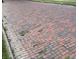 Charming street paved with vintage red bricks and small tufts of grass at 1352 Clinton St, Noblesville, IN 46060