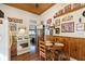 Kitchen showcasing wood accents, an electric stove, and adjacent dining area with Coca-Cola themed decor at 1352 Clinton St, Noblesville, IN 46060