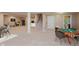 Multi-functional basement features a game table, gym area, stairs to main floor, and a full bathroom at 13693 Cunningham Dr, Carmel, IN 46074