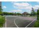 Community basketball and tennis courts near covered picnic and playground area at 13693 Cunningham Dr, Carmel, IN 46074