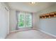 Bright bedroom with two windows covered by curtains allowing for lots of natural light to enter at 13693 Cunningham Dr, Carmel, IN 46074