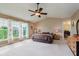 Spacious primary bedroom with vaulted ceilings, large windows, and ample natural light at 13693 Cunningham Dr, Carmel, IN 46074