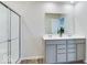 Bathroom featuring a double sink vanity and glass enclosed shower at 1529 Fairmount Dr, Greenfield, IN 46140