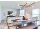 Stylish dining area adjacent to the living room, featuring modern light fixture at 1529 Fairmount Dr, Greenfield, IN 46140
