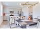 Modern kitchen with stainless steel appliances, quartz countertops, and a breakfast bar at 1529 Fairmount Dr, Greenfield, IN 46140