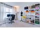 Office features natural light, a desk, and storage for shoes and purses at 1529 Fairmount Dr, Greenfield, IN 46140