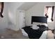 Bedroom featuring sloped ceilings, windows, and a comfortable bed at , Indianapolis, IN 46220