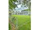 Expansive fenced backyard features a lush lawn, offering plenty of space for recreation and relaxation at 1831 Beckenbauer Ln, Indianapolis, IN 46214
