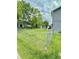 Fenced backyard with a well-maintained lawn, ideal for outdoor activities and privacy at 1831 Beckenbauer Ln, Indianapolis, IN 46214