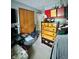 Bedroom features a wooden closet, neutral carpet, and coordinating furniture at 1831 Beckenbauer Ln, Indianapolis, IN 46214