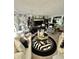 Chic living room features stylish décor, plush seating, a zebra-print rug, and a modern coffee table at 1831 Beckenbauer Ln, Indianapolis, IN 46214