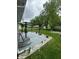 Outdoor patio area features a pergola, providing a relaxing space for entertaining or enjoying the backyard at 1831 Beckenbauer Ln, Indianapolis, IN 46214