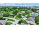 An aerial view of a neighborhood, highlighting tree-lined streets and well-maintained lawns at 1850 Longest Dr, Franklin, IN 46131