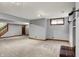 Finished basement features neutral walls, carpet, natural wood trim, and recessed lighting at 1850 Longest Dr, Franklin, IN 46131