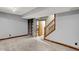 Finished basement includes built-in bookcase, carpeted floors, freshly painted walls, and recessed lighting at 1850 Longest Dr, Franklin, IN 46131