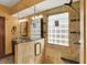 Bathroom showcasing a glass shower with a rainfall showerhead and decorative tiled walls at 1850 Longest Dr, Franklin, IN 46131