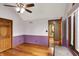 Bedroom with wood floors, ensuite access and large window with a cushioned seat at 1850 Longest Dr, Franklin, IN 46131