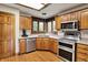 Charming kitchen features stainless steel appliances and a window over the sink with natural light at 1850 Longest Dr, Franklin, IN 46131