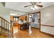 Open-concept space with hardwood floors seamlessly connecting the living room and kitchen area at 1850 Longest Dr, Franklin, IN 46131
