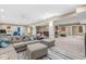Basement living area with spacious seating, a fireplace, and wet bar perfect for entertaining at 18514 Oriental Oak Ct, Noblesville, IN 46062