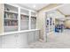 Basement bookcase with built-ins showing shelving and door to bedroom with bunkbeds at 18514 Oriental Oak Ct, Noblesville, IN 46062