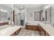 Bathroom featuring a soaking tub, a walk-in shower, marble countertops, and wood cabinets at 18514 Oriental Oak Ct, Noblesville, IN 46062