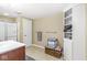 Neutral bathroom with a shower, tiled floor and a wooden cabinet at 18514 Oriental Oak Ct, Noblesville, IN 46062
