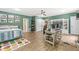 Spacious green-walled bedroom with dual closets, workstation and lots of natural light at 18514 Oriental Oak Ct, Noblesville, IN 46062