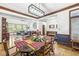 Open concept dining room with hardwood floors and view to the living room at 18514 Oriental Oak Ct, Noblesville, IN 46062