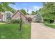 Beautiful brick home with manicured lawn, mature trees, and inviting curb appeal at 18514 Oriental Oak Ct, Noblesville, IN 46062