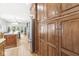 Kitchen boasts ample storage space with floor to ceiling wooden cabinets and stainless appliances at 18514 Oriental Oak Ct, Noblesville, IN 46062