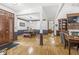 Open-concept home with dining area, showcasing hardwood floors and ample space at 18514 Oriental Oak Ct, Noblesville, IN 46062