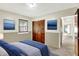 Inviting bedroom with calming colors, lots of light, and ample closet space at 1868 N Hawthorne Ln, Indianapolis, IN 46218
