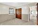 Empty bedroom with natural light and closet at 1868 N Hawthorne Ln, Indianapolis, IN 46218