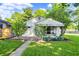 Charming single-Gathering home with a well-maintained lawn and inviting front porch at 1868 N Hawthorne Ln, Indianapolis, IN 46218
