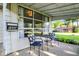 Cozy front porch with seating area perfect for enjoying the outdoors at 1868 N Hawthorne Ln, Indianapolis, IN 46218