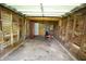 Interior of a wood framed detached garage with motorcycle inside at 1902 N Colorado Ave, Indianapolis, IN 46218